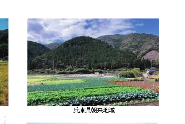 兵庫県朝来地域の山々と農地が広がる風景写真